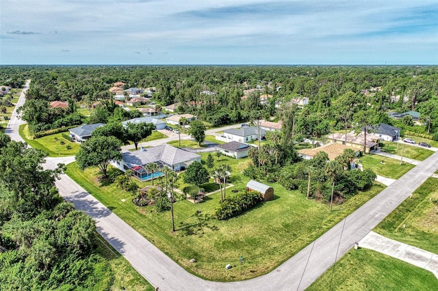 drone / aerial view with a forest view