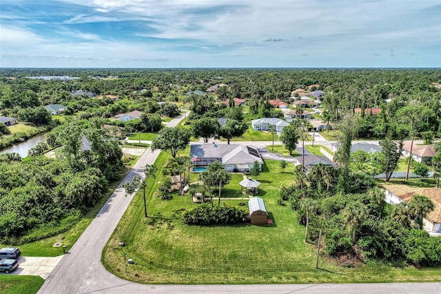 bird's eye view with a forest view