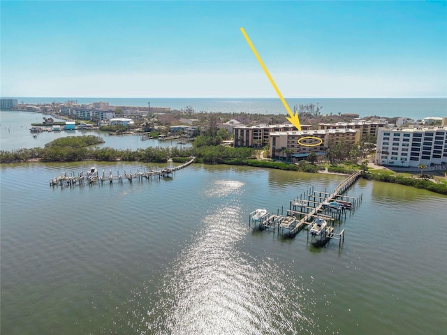 aerial view featuring a water view and a city view