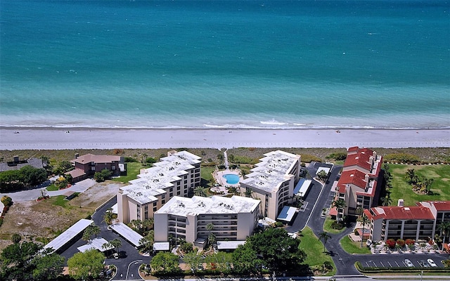 aerial view featuring a water view and a view of the beach