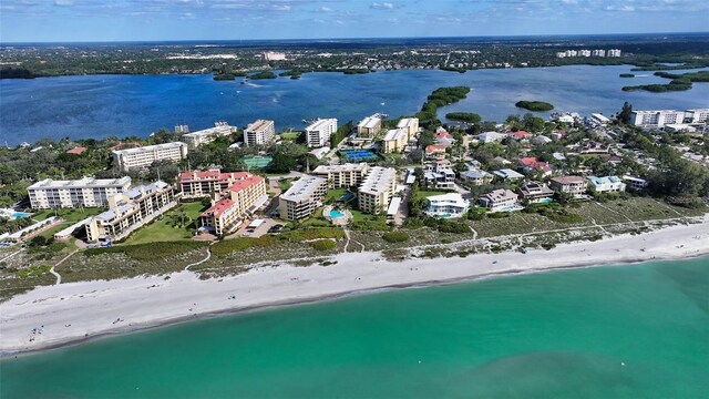 aerial view with a view of the beach and a water view