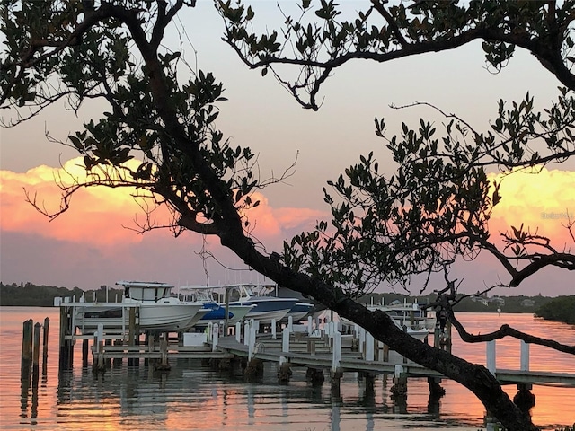 8767 Midnight Pass Rd Unit 403F, Sarasota, FL 34242 - dock with boat lift and a water view