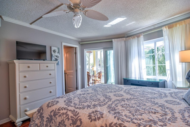 bedroom with access to outside, multiple windows, a textured ceiling, and ornamental molding