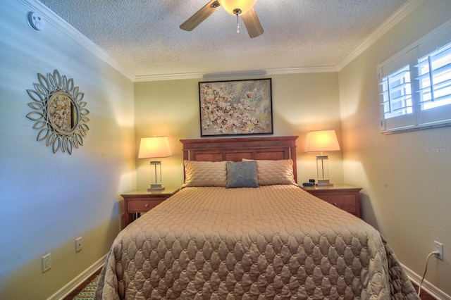 bedroom with a textured ceiling, a ceiling fan, baseboards, and ornamental molding