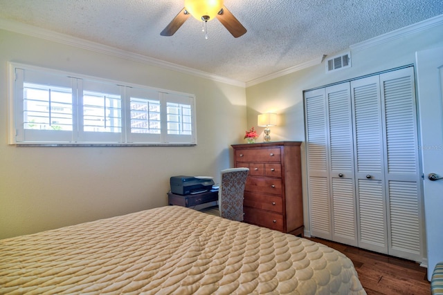 bedroom featuring multiple windows, wood finished floors, and ornamental molding