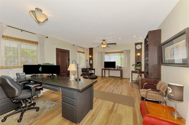 home office featuring recessed lighting, light wood-type flooring, and a ceiling fan