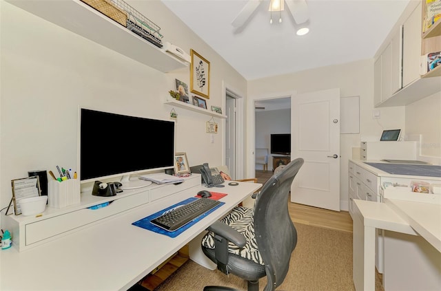 office area with a ceiling fan