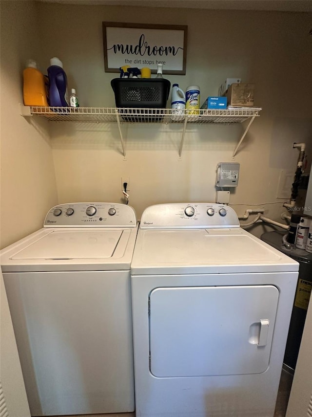 laundry room with washing machine and dryer