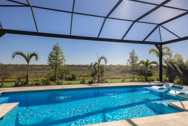 outdoor pool featuring glass enclosure