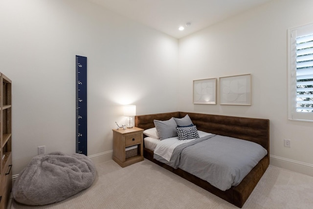 carpeted bedroom with recessed lighting and baseboards