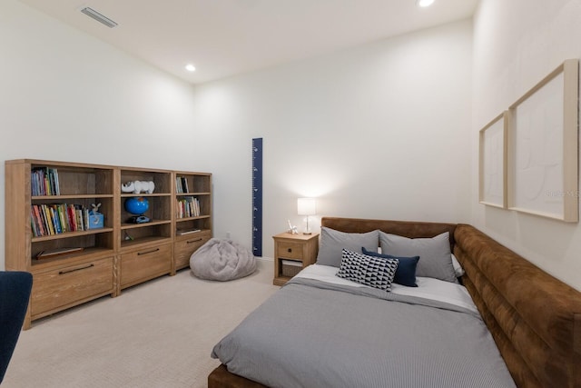 bedroom with recessed lighting, visible vents, and light colored carpet