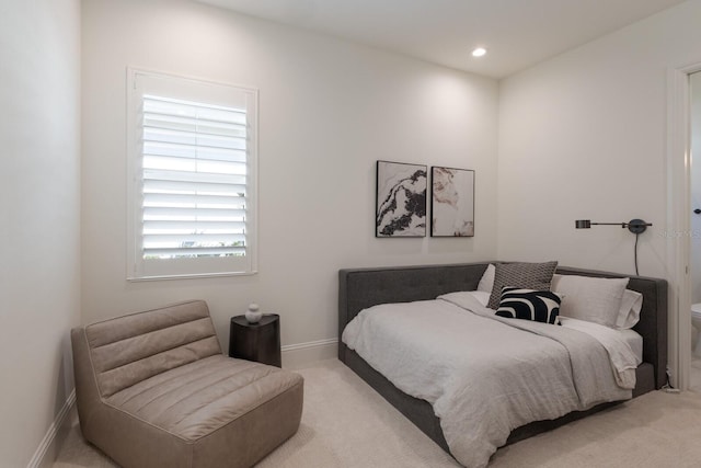 bedroom featuring recessed lighting, baseboards, and light carpet