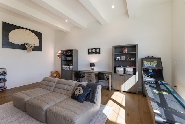 living area with recessed lighting, baseboards, beam ceiling, and light wood-style flooring