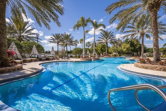 community pool with a patio