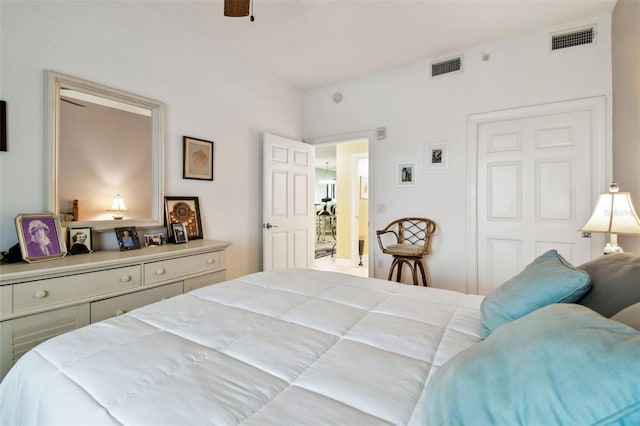 bedroom featuring visible vents and ceiling fan