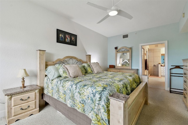 carpeted bedroom with visible vents and a ceiling fan