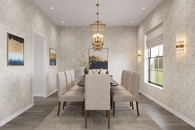 6137 Grove Blvd, Punta Gorda, FL 33982 - dining area with wood finished floors, wallpapered walls, baseboards, and recessed lighting