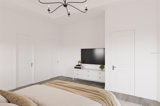 6137 Grove Blvd, Punta Gorda, FL 33982 - bedroom featuring a chandelier and wood finished floors