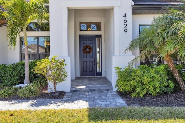 4629 Antrim Dr, Sarasota, FL 34240 - view of exterior entry with stucco siding