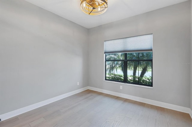 4629 Antrim Dr, Sarasota, FL 34240 - empty room featuring wood finished floors and baseboards