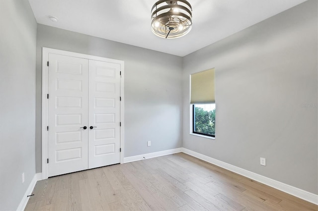 4629 Antrim Dr, Sarasota, FL 34240 - spare room with baseboards and wood finished floors