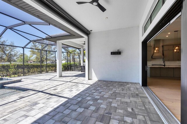 4629 Antrim Dr, Sarasota, FL 34240 - view of patio / terrace featuring glass enclosure, a ceiling fan, and a pool with connected hot tub