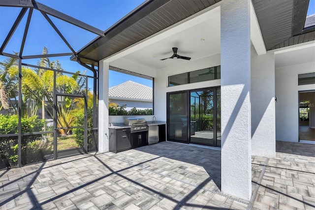 4629 Antrim Dr, Sarasota, FL 34240 - view of patio / terrace with a ceiling fan, glass enclosure, a sink, and area for grilling