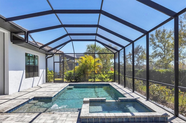 4629 Antrim Dr, Sarasota, FL 34240 - view of pool featuring a lanai, a pool with connected hot tub, and a patio