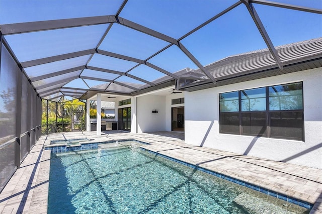 4629 Antrim Dr, Sarasota, FL 34240 - view of swimming pool featuring glass enclosure, a pool with connected hot tub, a patio, and ceiling fan