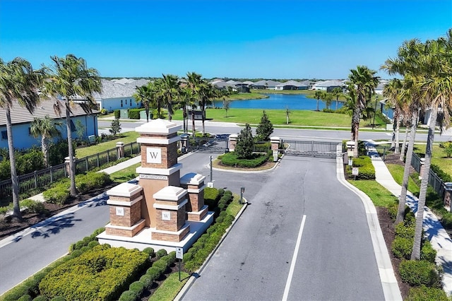 4629 Antrim Dr, Sarasota, FL 34240 - view of road with a water view, a residential view, a gated entry, and curbs