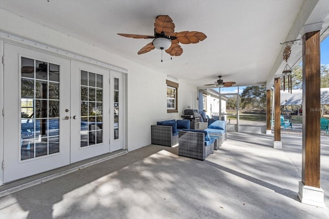 view of patio with an outdoor living space, french doors, and ceiling fan