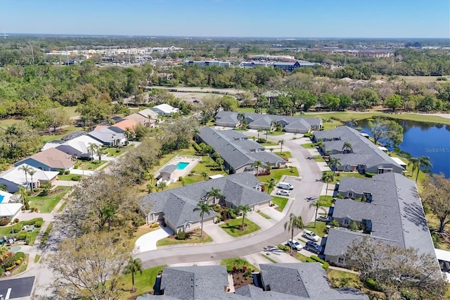 aerial view with a residential view and a water view