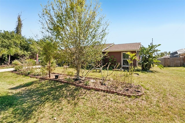 view of yard with fence