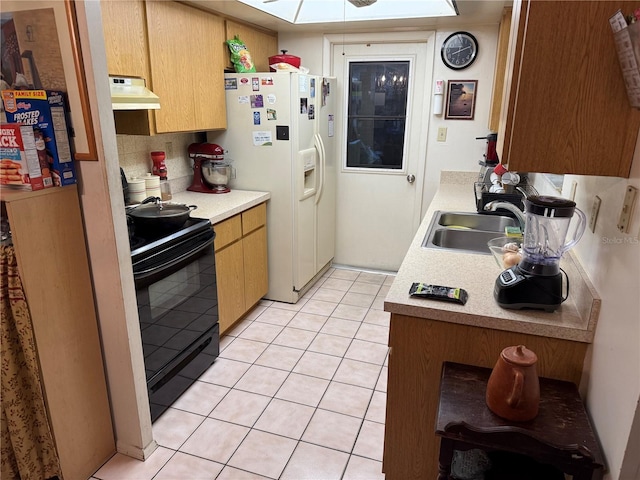 2678 Rock Creek Dr, Port Charlotte, FL 33948 - kitchen featuring black electric range oven, premium range hood, white refrigerator with ice dispenser, and light countertops