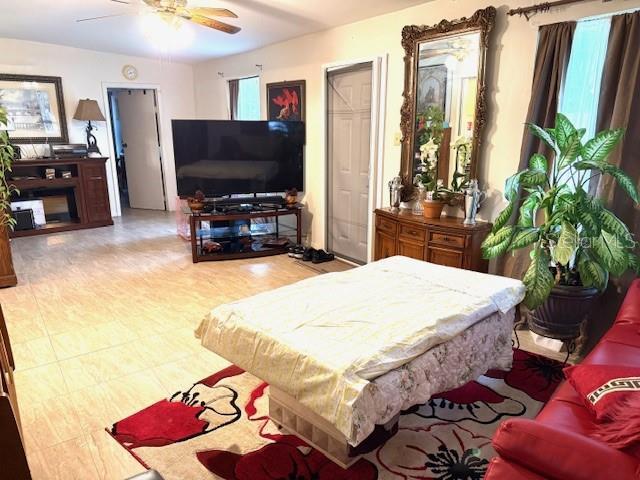 2678 Rock Creek Dr, Port Charlotte, FL 33948 - bedroom featuring a ceiling fan
