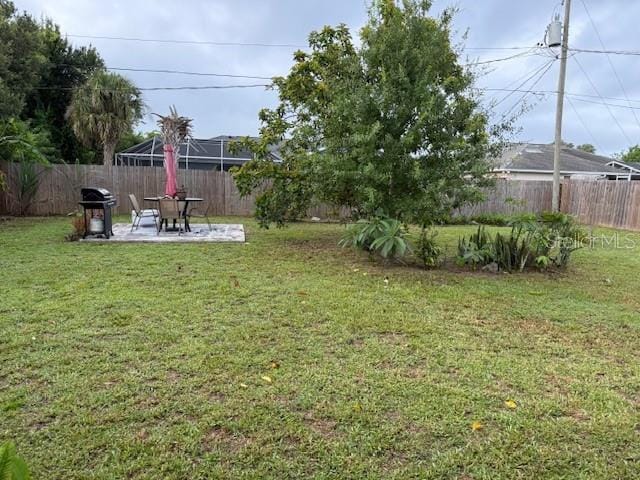 2678 Rock Creek Dr, Port Charlotte, FL 33948 - fenced backyard with a patio