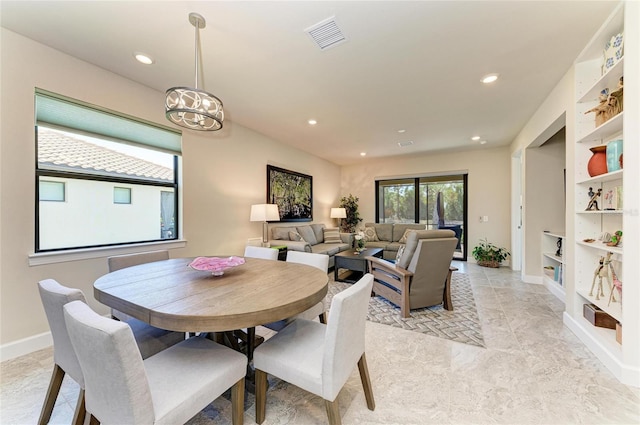 dining area with visible vents, recessed lighting, baseboards, and built in features