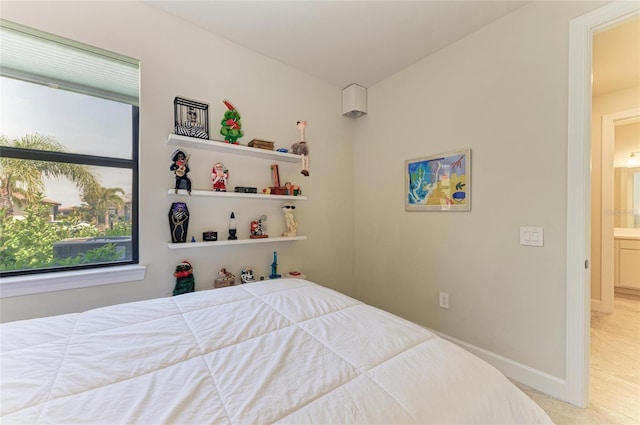 bedroom with baseboards