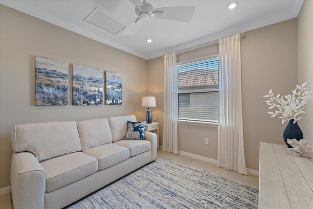 living area featuring crown molding, carpet flooring, a ceiling fan, and baseboards