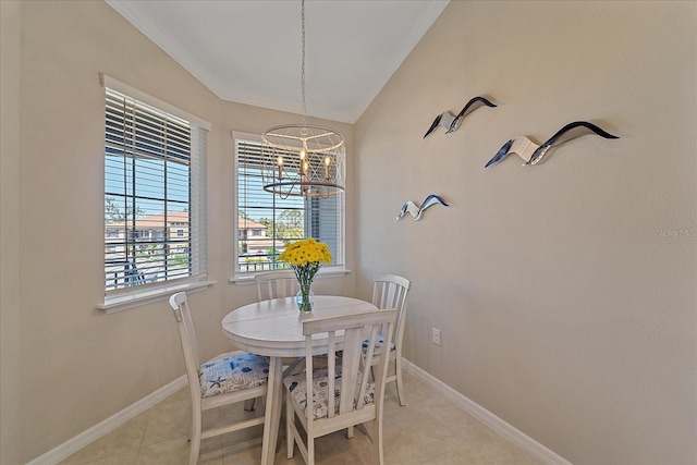 dining area with an inviting chandelier, light tile patterned floors, baseboards, and vaulted ceiling