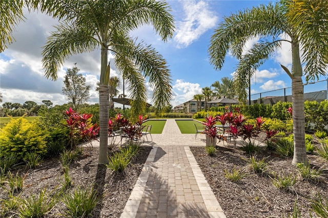 view of property's community featuring fence