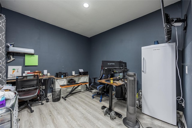 office space featuring wood finished floors