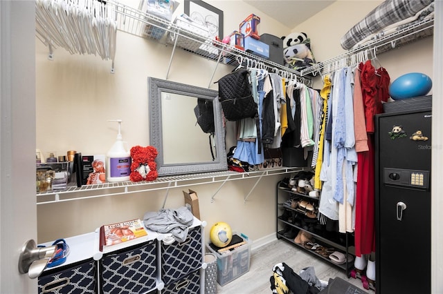 spacious closet featuring wood finished floors