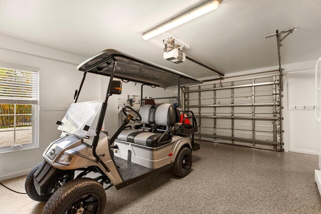 garage featuring a garage door opener