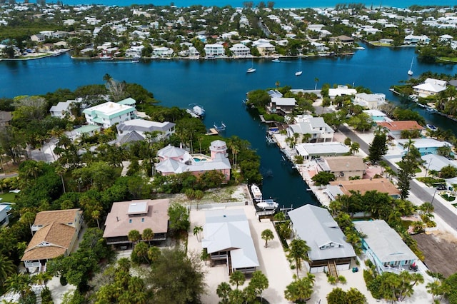 aerial view featuring a residential view and a water view