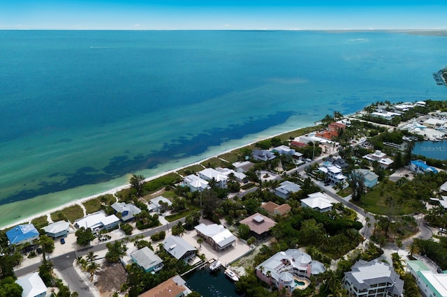 birds eye view of property with a residential view and a water view