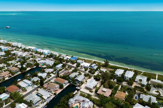 aerial view featuring a residential view and a water view