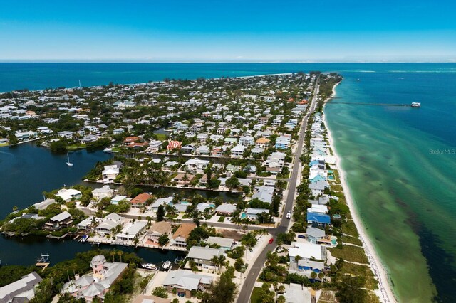 aerial view with a residential view and a water view