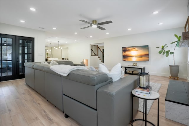 living area with recessed lighting, french doors, light wood finished floors, and ceiling fan