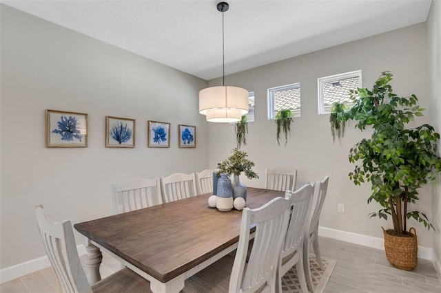 dining space with baseboards